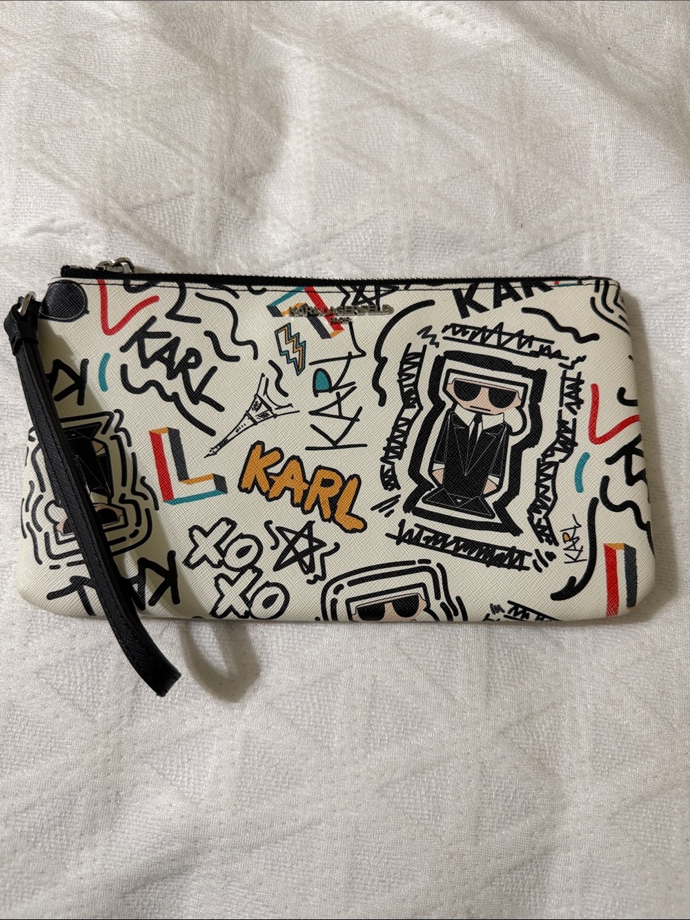 Karl Lagerfeld White Graffiti Print Wristlet with Black Strap ( final sale)